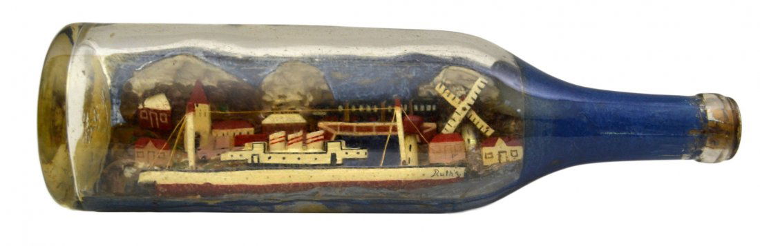 Ship In a Bottle, 'Ruth', passenger stmsh c. 1940: Ship In a Bottle, 'Ruth', passenger stmsh c. 1940 The Vessel Name: 'Ruth' Country of Origin: ? Type: Passenger Steamship Hull: Red, white & black Rigging: Two spar masts Deck Furniture: Cabins Decorat