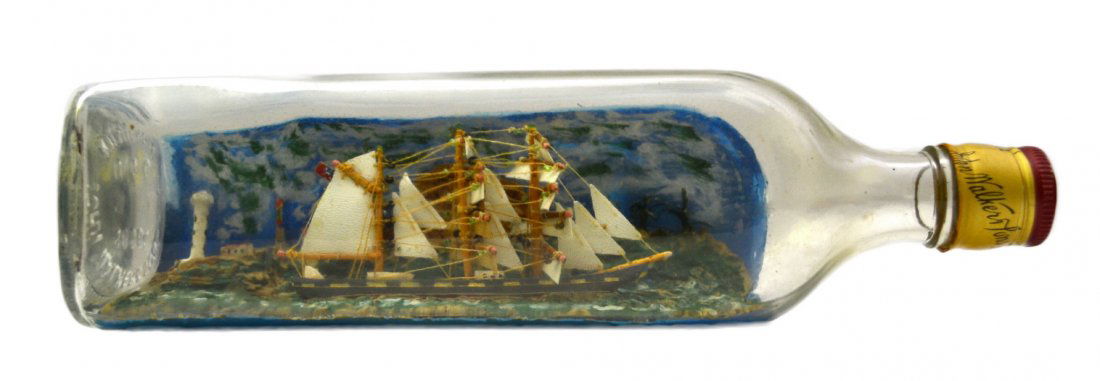 Ship In a Bottle, c. 1950: Ship In a Bottle, c. 1950 The Vessel Name: None Country of Origin: America Type: Bark Hull: Red and grey Rigging: Fully rigged, glass blocks and sails Deck Furniture: Deck house and small boat Decorat