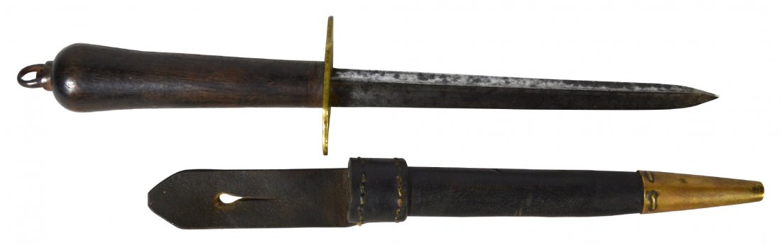 Dirk, naval, French, boarding, early 19th C: Dirk, naval, French, boarding, early 19th C French naval dirk Material: Steel, brass, wood and leather Marks: 2 stamped cartouches Features: Carved wood grip, blade with fuller and guard of brass. Per
