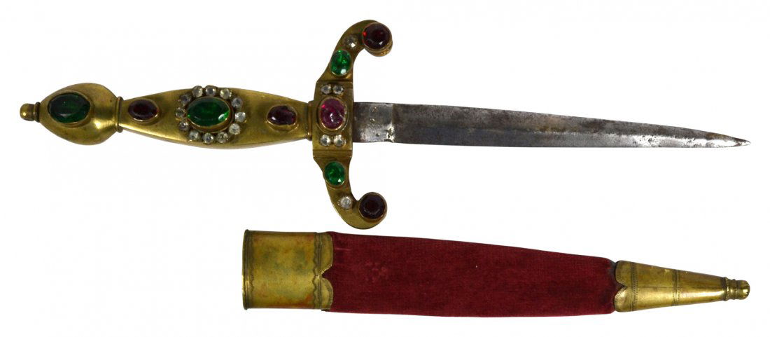 Dagger w/ Sheath, Jewel Decorated: Dagger w/ Sheath, Jewel Decorated Dagger. Material: Brass, steel and velvet. Construction: Cast. Marks: None. Features: Handle, pommel and cross guard is decorated with jewels. Sheath is wrapped in re