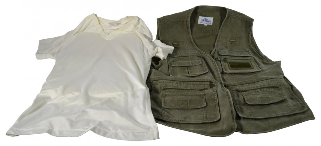 2, Bulletproof shirt and 1 vest: 2, Bulletproof shirt and 1 vest Maker: Second Chance Age: C 1990-2010 Description: 1 second chance body armor tee shirt and 1 tactical vest. Provenance: Florida estate Size: 19"X12"X4" box Weight: 5 L