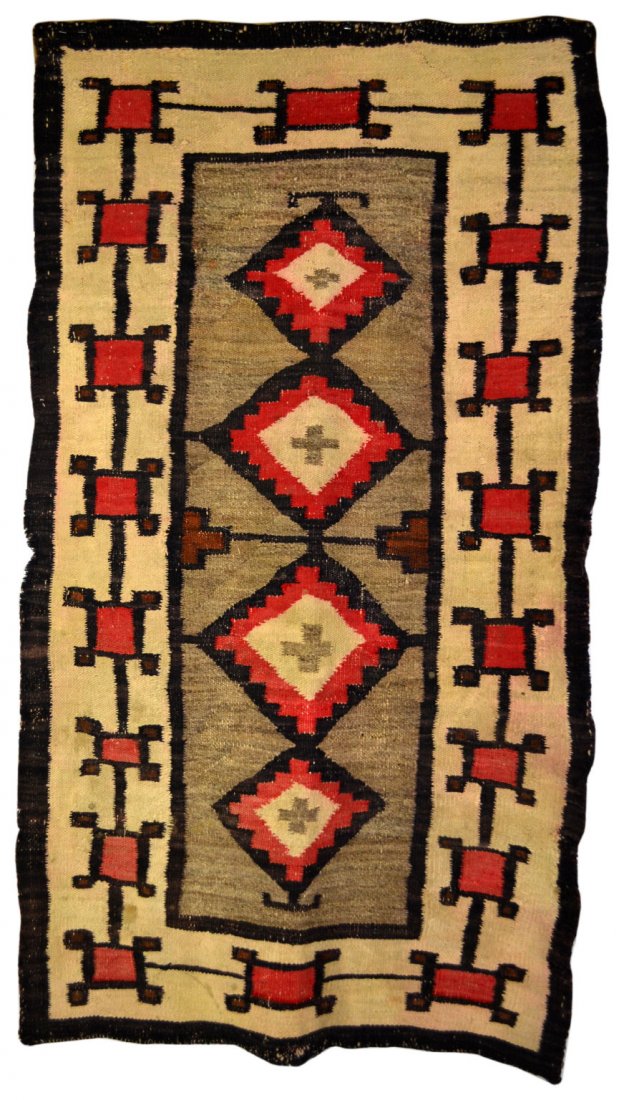 Rug, Salitto, Navajo c.1930: Rug, Salitto, Navajo c.1930 Rug Maker: Native American Materials: Wool Age: Circa 1930 Description: Rug, geometric patterns,black, red and earth tones. Provenance: Miki & Jay Mangan III Size: 54" L x 