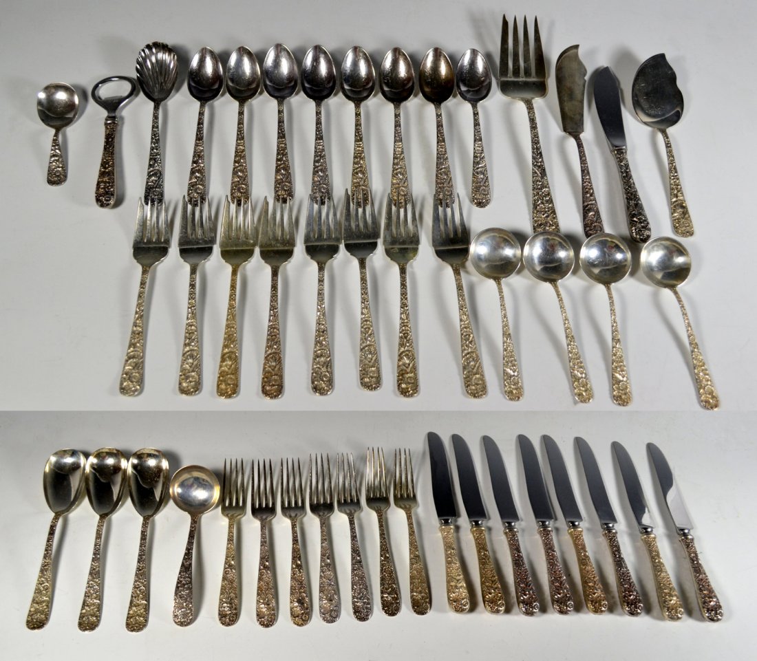 Sterling Silver Flatware, 46 Piece, S. Kirk & Son: Makers Mark: S. Kirk & Son Sterling Country of Origin: America Decoration: Floral repousse pattern. 8 teaspoons, 8 knives, 7 forks, 8 salad forks, 2 butter knives, 3 serving spoons, 1 serving fork, 4 