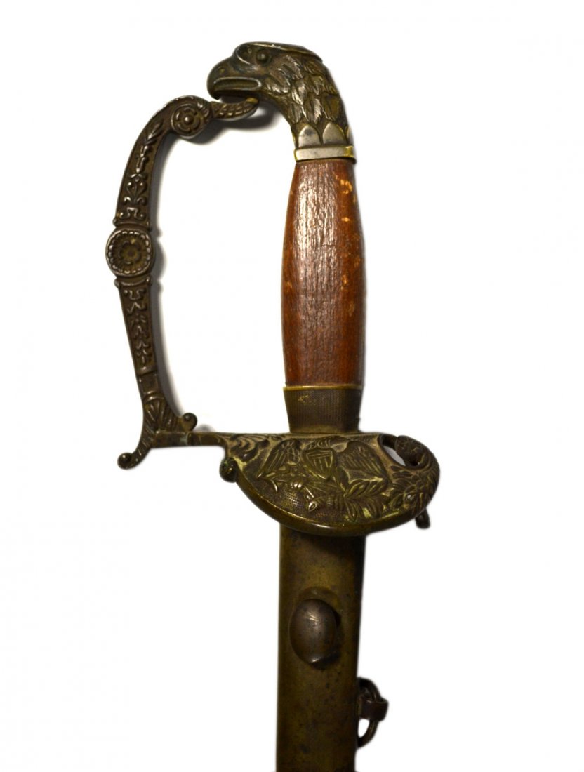 American Eagle Pommel, Ignatius Cooper's family: Sword Material: Brass, steel, wood, leather Construction: Through mounted and peened Marks: Initialed G.D.? L. in Solingen Features: Eagle head pommel and shell guard with eagle holding laurel wreath