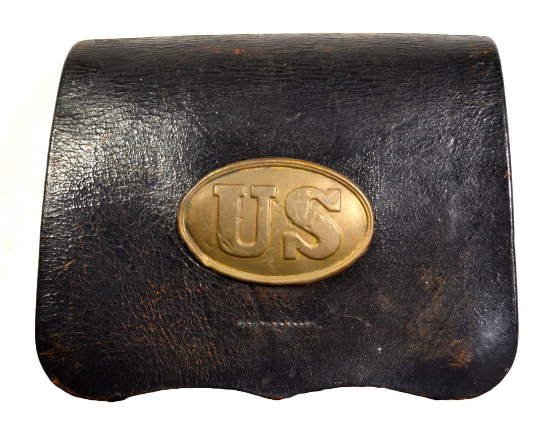 Cartridge Box, w/ U.S. Plate, Civil War: Cartridge box Age: Circa 1865 Materials: Leather & brass Description: Cartridge box with U S oval brass plate backed with iron loops and interior having two tole containers for cartridges. Leather app