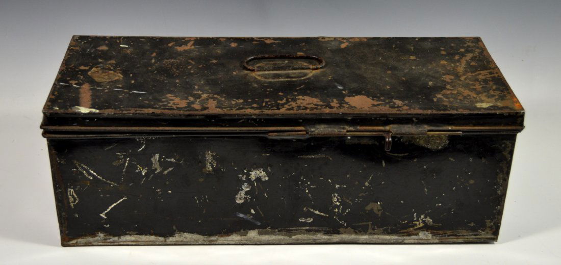 Tole box for military hat and epaulettes: Age: 19th century Maker: Unknown Materials: Tin Construction: Folded and soldered Description: Interior of box has built in container for officer's hat and epaulettes. Size: 18" L x 6.7" W x 6.5" H We