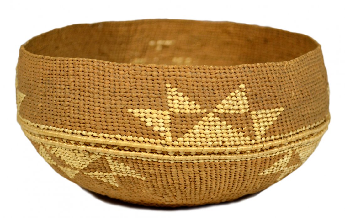 Basket, Hupa or Yurok, Native American Indian: Basket Materials: Vegetable fibers Age: Early 20th Century Description: A Native American Indian basket from Northern California, either the Hupa or Yurock tribe. Tight twined construction with geomet