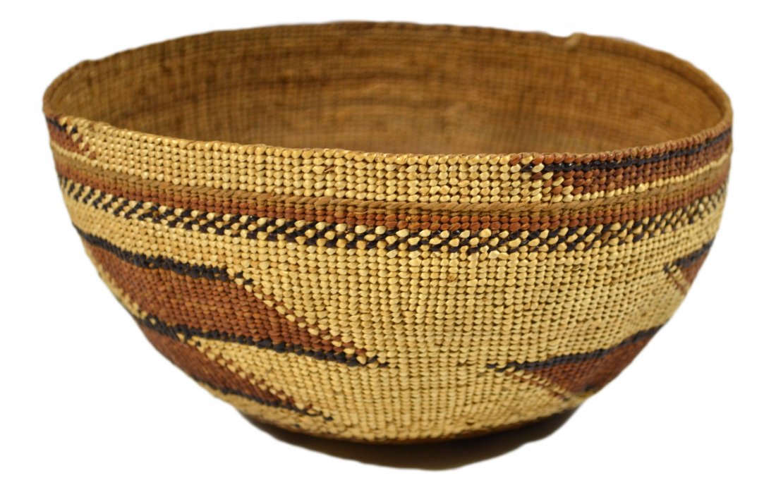 Basket, Hupa or Yurok, California: Basket Materials: Vegetable fibers Age: Early to Mid 20th Century Description: A Native American Indian basket from Northern California, either the Hupa or Yurock tribe. Tight twined construction with