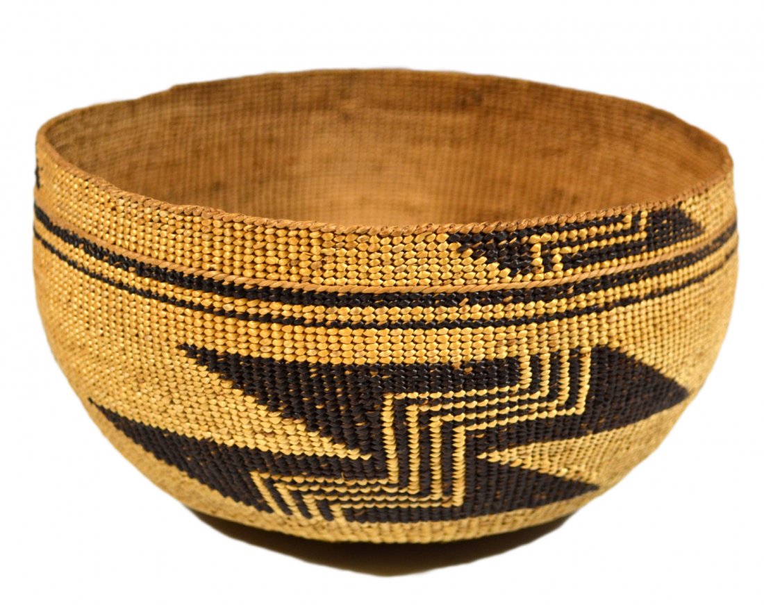 Basket, Hupa or Yurok, California, Early 20th C.: Basket Materials: Vegetable fibers Age: Early 20th Century Description: A Native American Indian basket from Northern California, either the Hupa or Yurock tribe. Tight twined construction with geomet