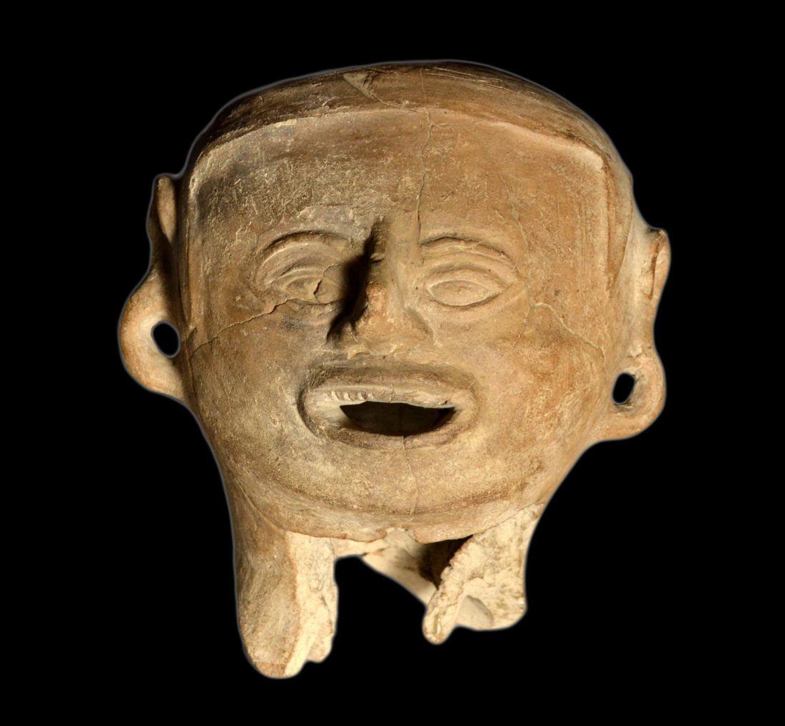 Xipe Totec or sacrificial victim head sculpture: Sculpture fragment Material: Terra cotta Construction: Hand formed Period: c. 300 A.D. Features: Provenance: Dr. James E. Connor ,1939-1994- Ford White House, secy. to the cabinet, administrator to th