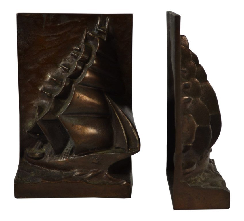 Pair of Bookends, Cast Iron, Ship, c. 1930: Bookends Pair of Bookends Form: 3 Masted Ship Material & Finish: Cast Iron, bronze Construction: Molded Features: 3 Masted ship, Full sail Maker & Markings: "2" and "234" on back. Size: 6.75"H x 4.5"W