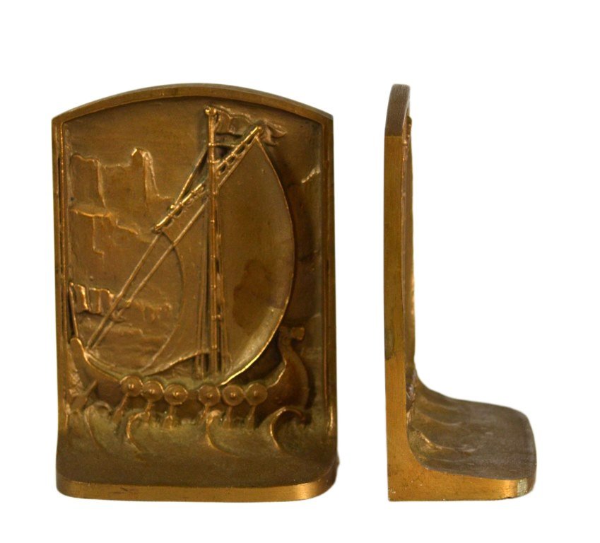 Pair of Bookends, Ships at Sail, Bronze, 1920's: Bookends Pair of Bookends Form: Ships Material & Finish: Bronze Construction: Cast Features: Ship at sail Maker & Markings: N/A Size: 6" H x 4.5"W x 2"D Weight: 4.4 lb Condition: Light wear. Meta: Boo