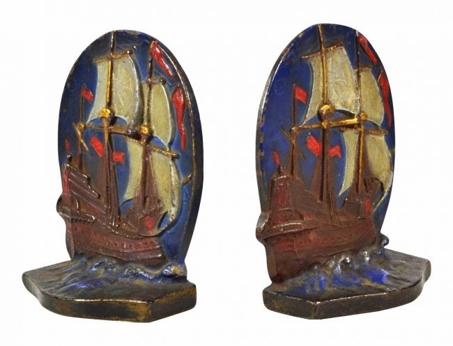 Pair of bookends, Ship, Albany Foundry, c.1920's: Bookends Pair of Bookends Form: Ship Material & Finish: Painted Construction: Cast Iron Features: Full Sail Ship Maker & Markings: Albany Foundry Size: 6.5"H x Weight: 6.6 lb Condition: Light wear. Me