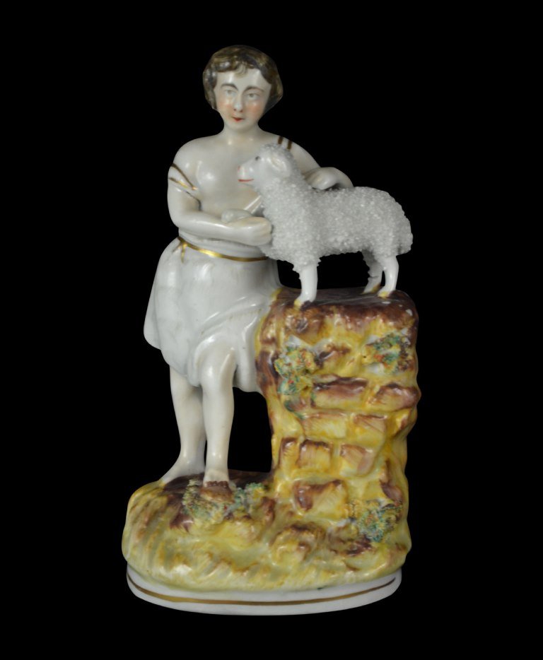 Figure, Staffordshire, St.John & the Lamb, c 1830: Form: Figure Components: Hard Paste Decoration: St. John the Lamb is hand painted, glazed and gilded. Colors: White, Brown, Gold Markings: None Date: 19th C. Provenance: The estate of Arthur J. Connol