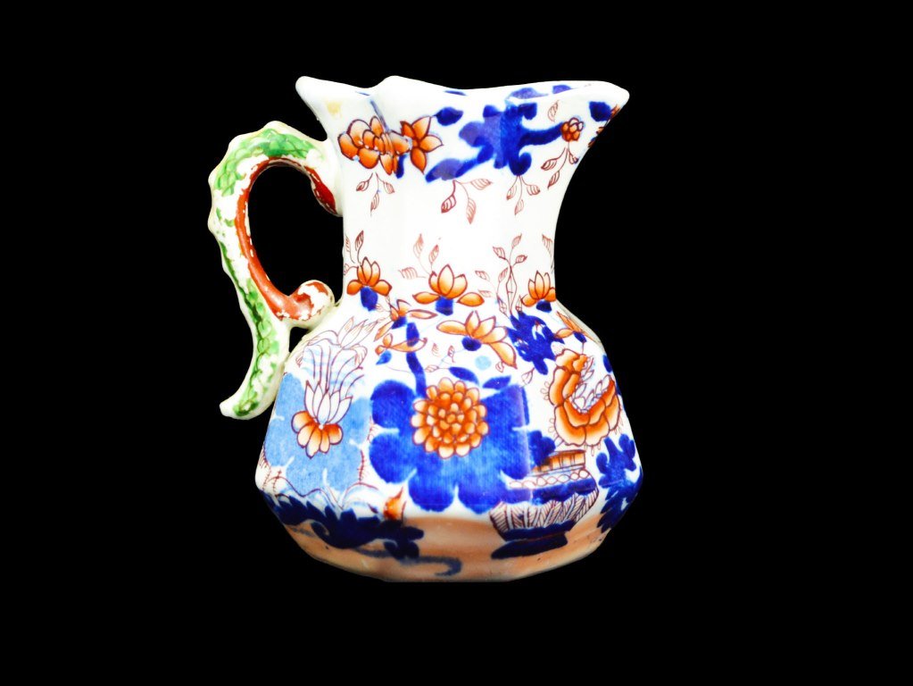 Pitcher, Mason Ironstone, Japan pattern, C. 1840: Form: Pitcher Components: Hard paste Decoration: Pitcher depicts flowers and has a handle in the shape of a serpent. Colors: Green, red, blue Markings: Marked on bottom Date: c. 1840 Provenance: The e