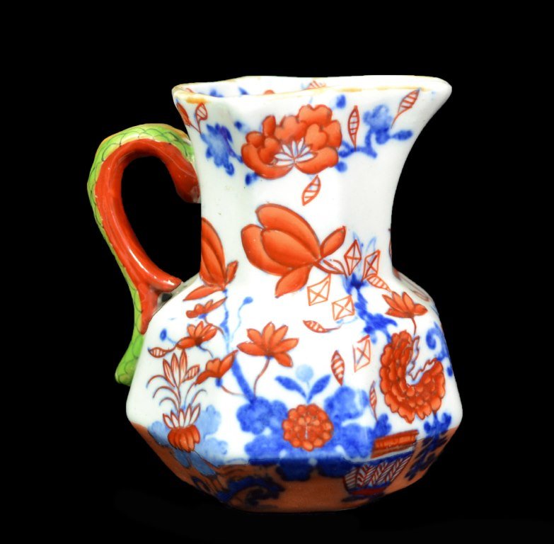 Pitcher, Mason Ironstone, Japan pattern, C. 1848: Form: Pitcher Components: Hard paste Decoration: Decorated in the Japan pattern depicting flowers. The handle is in the shape of a serpent. Colors: Blue, orange, green, Markings: Marked on bottom Date