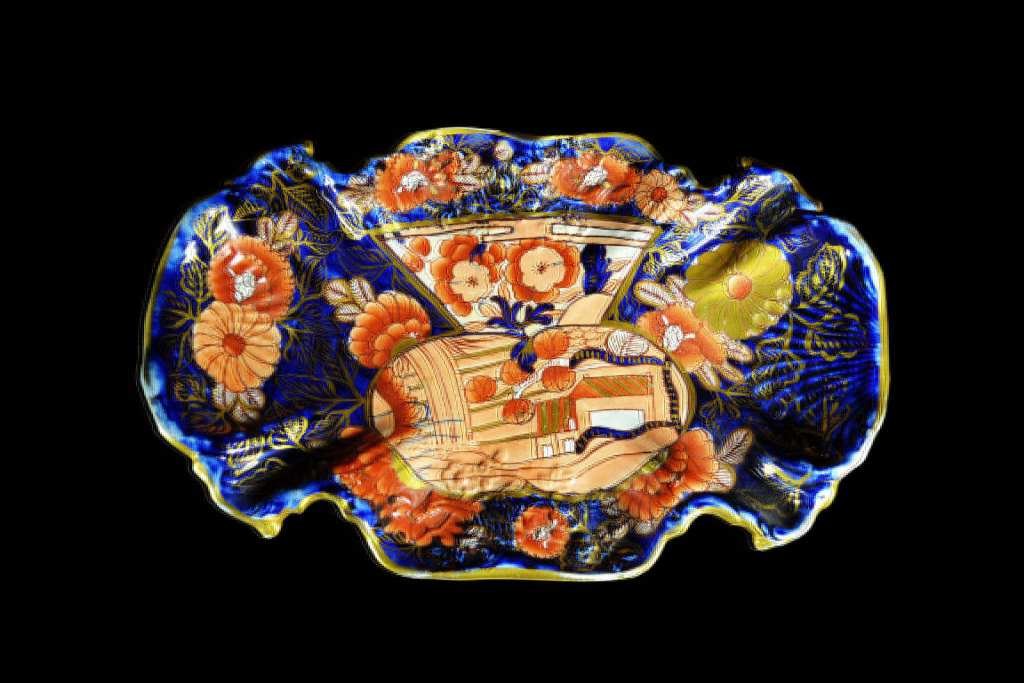 Compote, Footed, Mason Ironstone Tazza: Form: Footed Campote Tazza Components: Hard Paste Decoration: Campote, Footed Tazza is decorated in floral pattern with other figures, Colors: Blue, Orange, Gold Markings: None Date: 19th century Prov