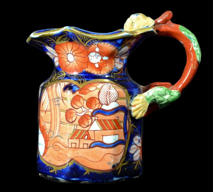 Jug, Mason Ironstone, c. 1820: Form: Jug Components: Hard Paste Decoration: Jug is hand painted and glazed. Handle depicts a dragon. Colors: Red, Blue, White, Gold Markings: N/A Date: c. 1820 Provenance: The estate of Arthur J. Con