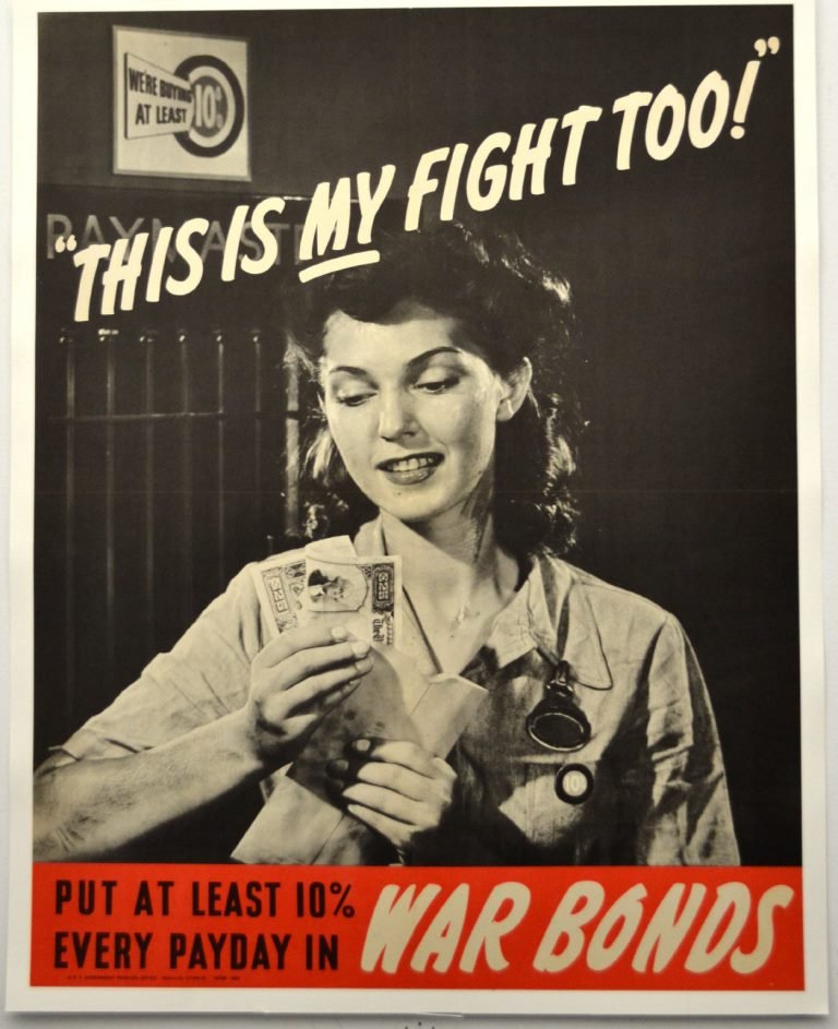 WWII This is My Fight Too, 10% War Bonds: Artist: Anonymous Artist Dates: Unknown Signed Within Plate: None Date of Work: 1942 Description: The poster image is a black & white photograph of a smiling woman, holding and looking at folded $25 w