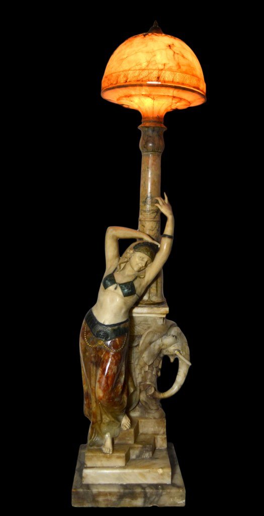 Floor Lamp, alabaster and marble, Early 20th c.: FloorLamp Maker: Unknown Marks: None Age: Early 20th Century Description: A large alabaster lamp in the art deco style with some use of marble. Depicts a woman and an elephant. Consigner states the it