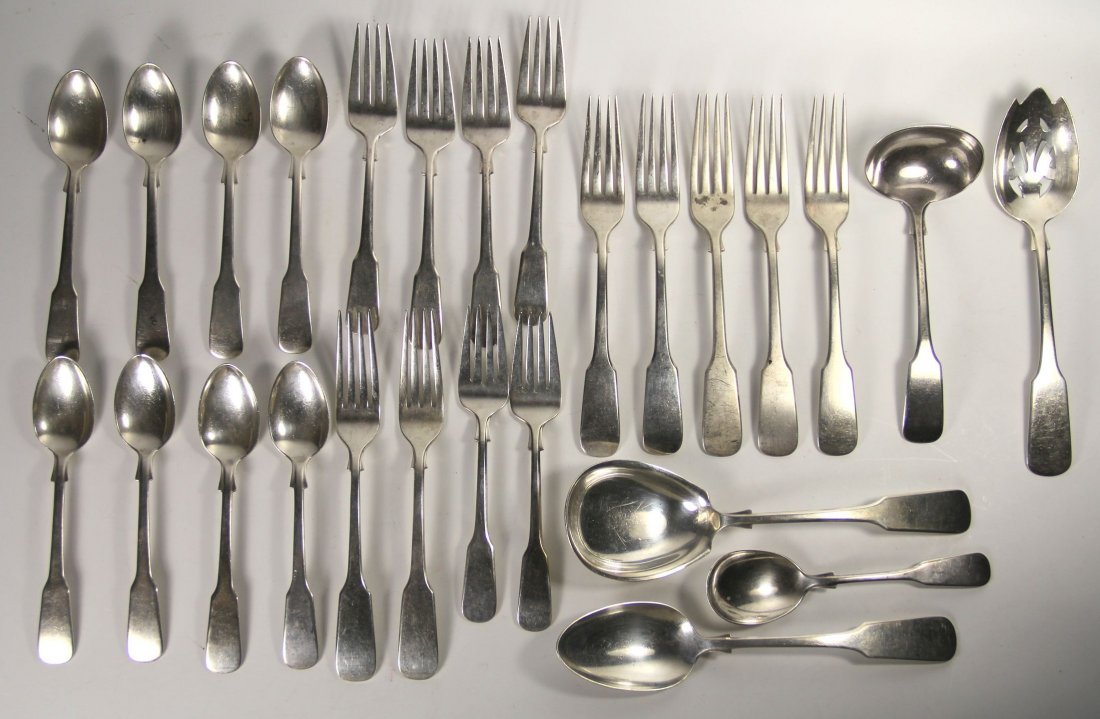 Silverware, International Sterling (25), 1810: Cutlery Set Age: 20th c. Maker: International Materials: Sterling Silver Construction: Cast silver Description: This set of silverware consists of spoons, forks, serving spoons, and serving forks. On 
