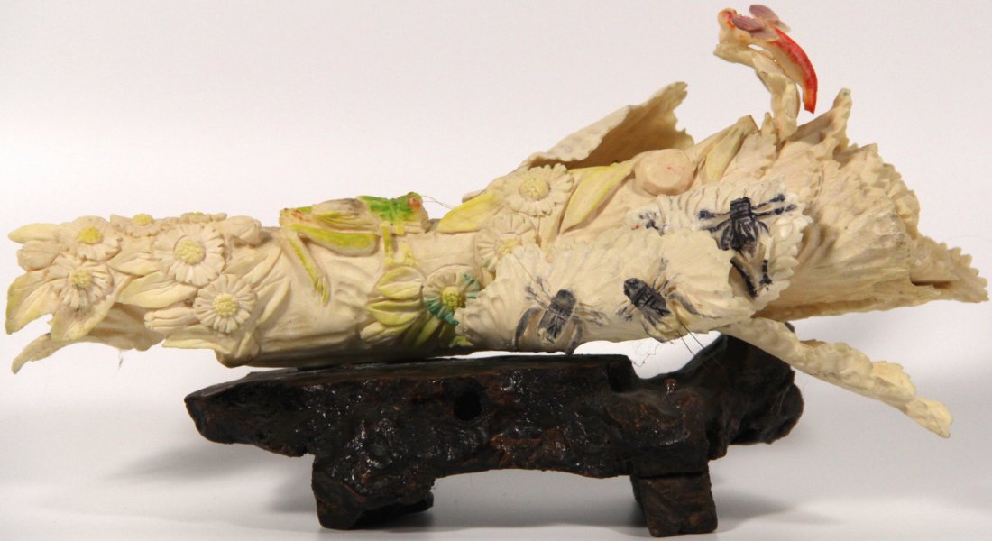 Ivory Carving, Chinese, C. 1950: Ivory carving of log Material: Ivory Construction: Hand carved Marks: None Colors: Ivory with red, yellow, black, and green Description: Delicately, but finely carved, this piece conveys a lively scen