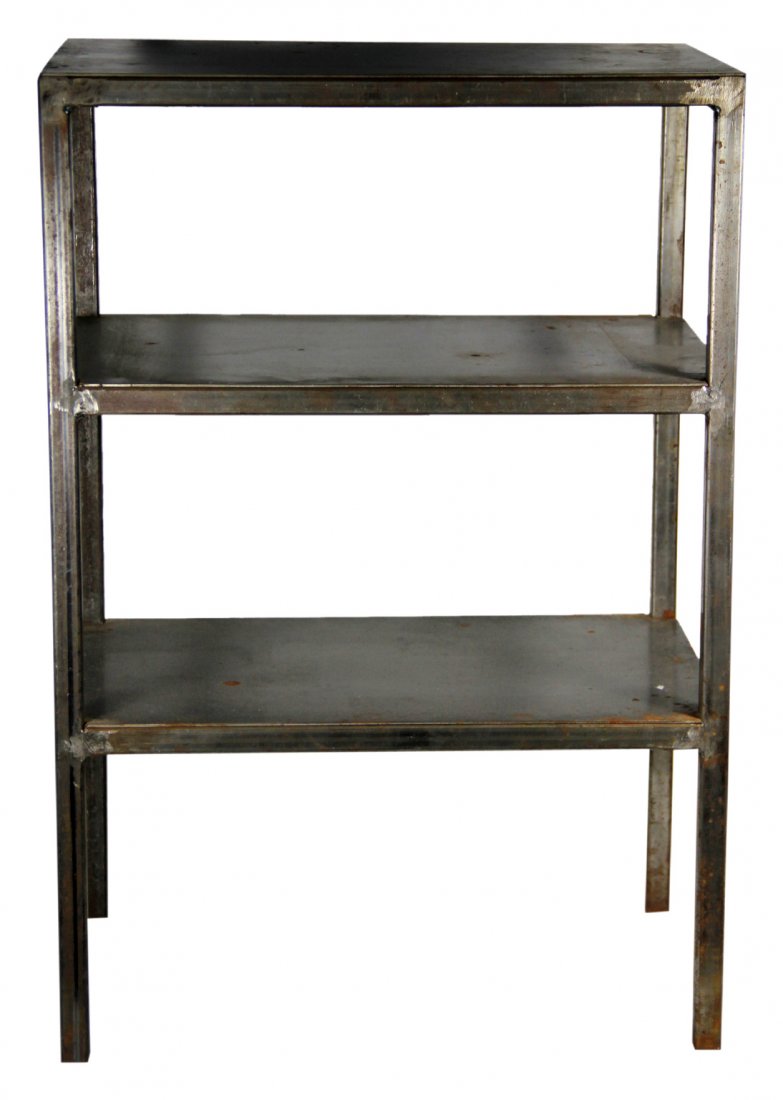 Table, metal, three tiered, 20th C.: Metal Table Wood: Iron Secondary Wood: None Joinery: Screws, soldering Features: This corner table features three shelves, welded to the four legged frame. Each shelf is perfectly flat and affixed at 