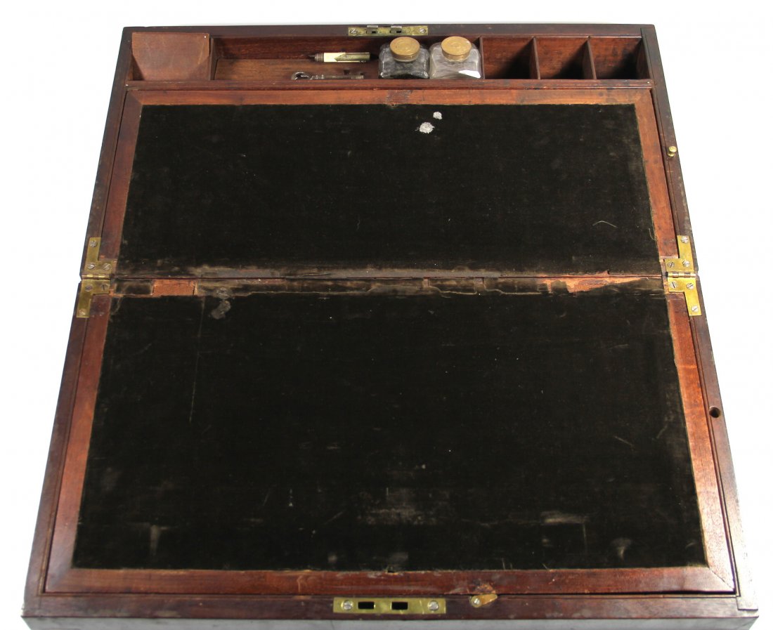 Robert Ludlow's Mahogany Travel Desk, 1822: Travel Desk Wood: Mahogany Secondary Wood: N/A Joinery: Dovetail and hinging Features: This travel desk consists of several compartments within a locked chest. The key is present with the box, locking