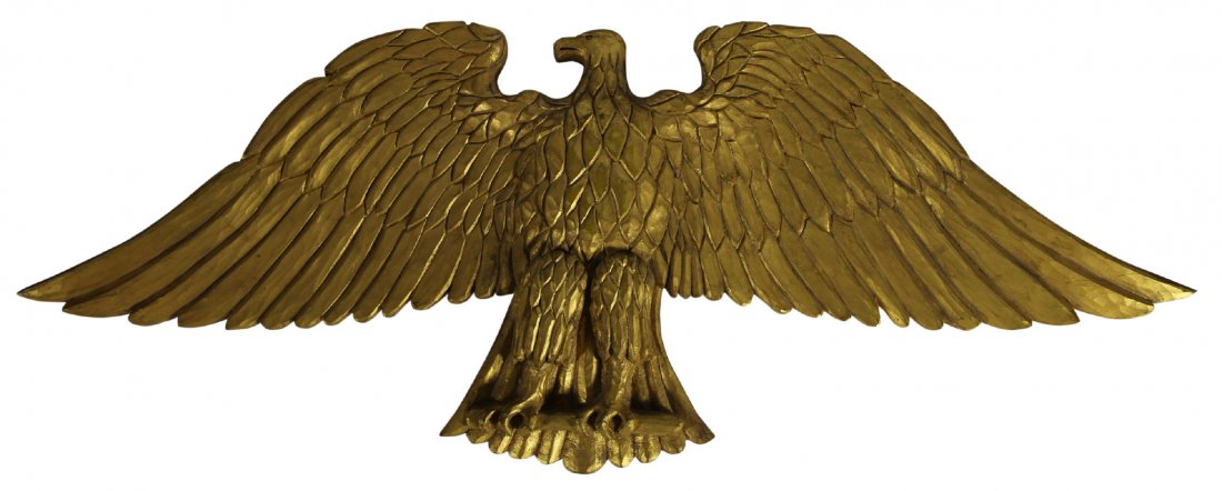 Eagle Carving, John Upton, Bremen ME: Gilt wood carved eagle Age: 1952 Materials: Wood, Gilt Marks: J. Upton Eagle #17, Bremen, ME Country of Origin: United States Description: This eagle is carved from a pine and gilded gold on the front