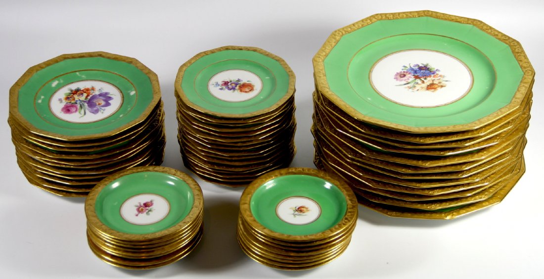 Rosenthal Porcelain, Maria, Circa 20th C.: Form: 55 piece dinnerware set Components: 12 Dinner, 11 Dishes, 16 plates/saucers Decoration: The plates all have gold gilding along the rims, green interiors, and white centers decorated with a bouqu