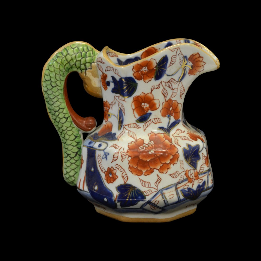 Pitcher, Mason Ironstone, c. 1820: Form: Pitcher Components: Hard Paste Decoration: Floral decoration with blue underglaze and gilded details. Handle has shape of a dragon. Colors: Multi. Green, Blue, Gold Markings: Ironstone China Dat