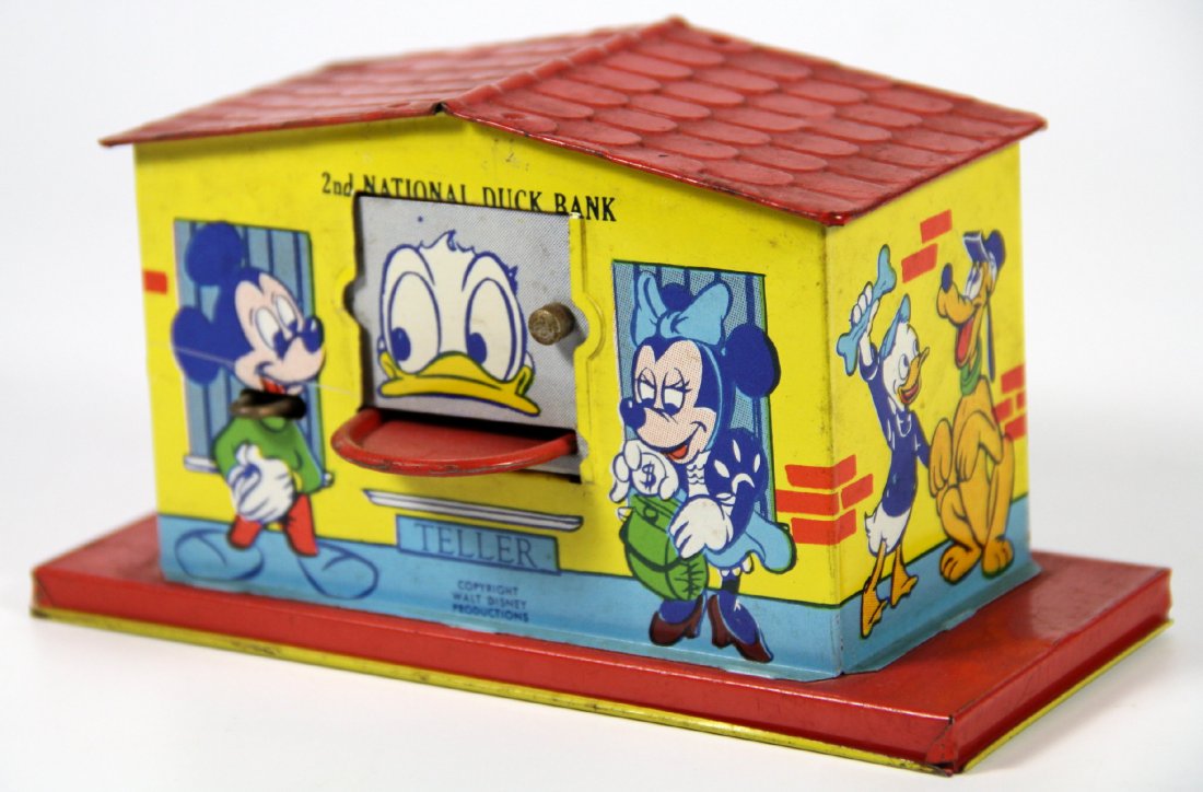 Toy, Walt Disney Bank, Chein, 1950: Age 1950 Size H. 3.5x W. 5.5x D. 2.5" Weight 4.5oz Maker Chein Materials Tin Labels/Signatures Walt Disney Productions Finish Lithography Stopper Twist Provenance NJ Estate Description This bank shows