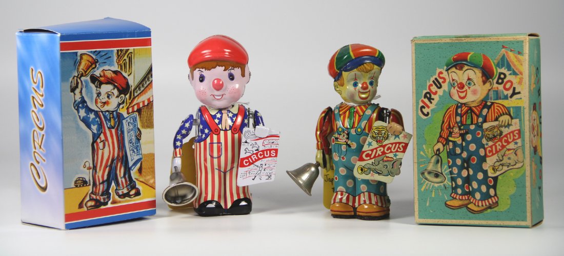 Toys (2) Tin Circus Boys, Japanese & Amer. 60-70s: Circus Boy tin toys Maker: Nomura Materials: Tin, paint Construction: tinplating Labels/Tags: Come with original boxes Age: 1960s Description: Pair of tin Circus Boys, painted tin. Wind up, ring bell,