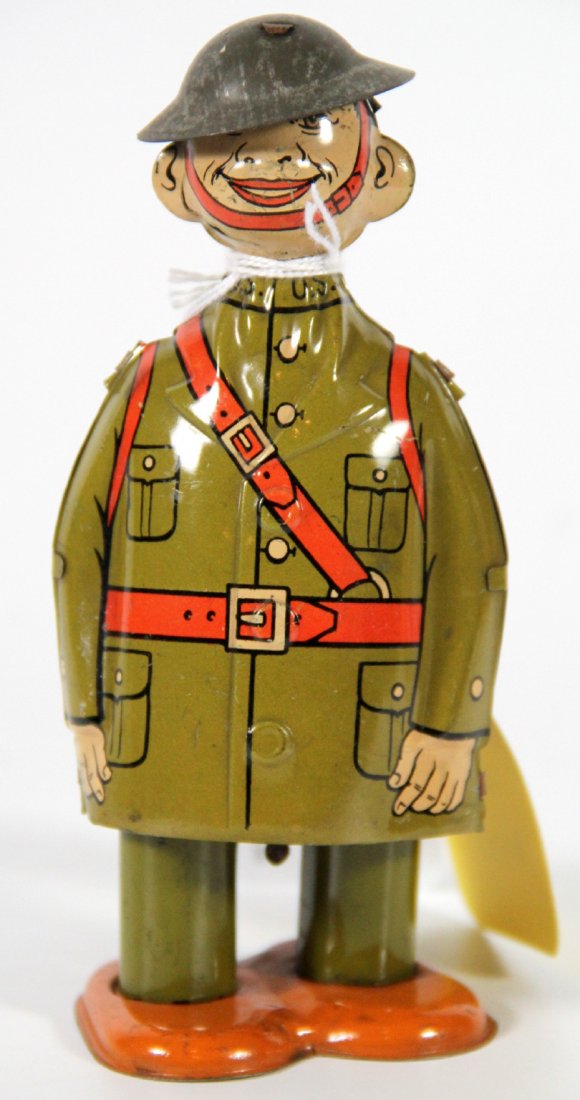 Toy, Tin Chein 'Dough Boy', c.1940: Tin Toy Dough Boy Maker: Unmarked Chein Materials: Tin Labels/Tags: Unmarked Age: C. 1940 Description: Smiling key wind-up 'Dough Boy' sports a grey metal helmet and Army uniform and walks forward whe
