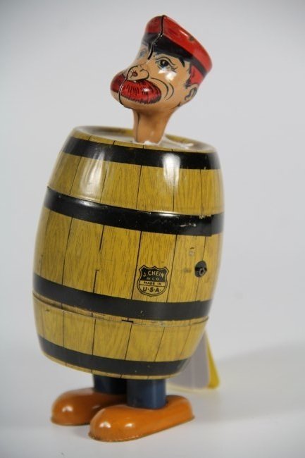 Toy, Tin Chein Sailor Barrel Walker, c.1930: Tin Toy Sailor in Barrel Maker: Chein Materials: Tin Labels/Tags: J. Chein & Co., U.S.A. Age: c.1930 Description: Wind-up sailor housed in a barrel has an integrated key. Size: 3-5/8"Wx7"Hx3.75D Prove