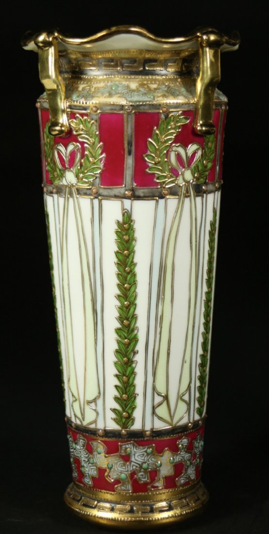 Vase, Nippon, Japanese hand decorated: Description: A hand painted, enameled and gilt with green laurel wreaths and ribbons, has a stamp of a maple leaf Nippon, hand painted on the bottom. The maple leaf Nippon, dates back to 1891. Materia