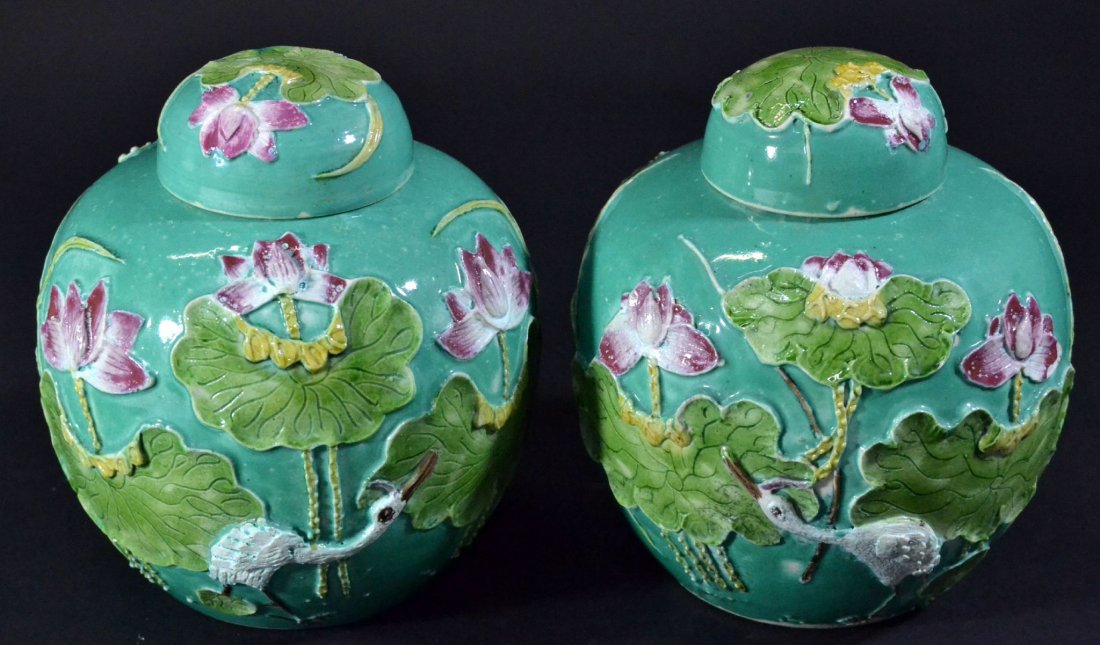 (2) Covered Jars, Marked China, 20th C.: Description: A pair of ginger jars, mint green in color with a floral pattern on the jars and matching lids. Marked China on the bottom. Material: Pottery Maker/Artist: Unknown Date: c. 20th century P