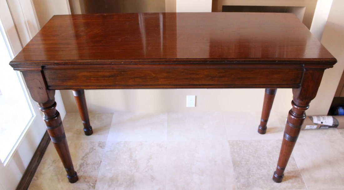 Pier Table, c. 1830: Description: Constructed of mahogany solids & veneered pine secondary woods. Two board top having plane molded edges, aprons are 1/2' thick mahogany laminated to pine with the whole resting on one pie