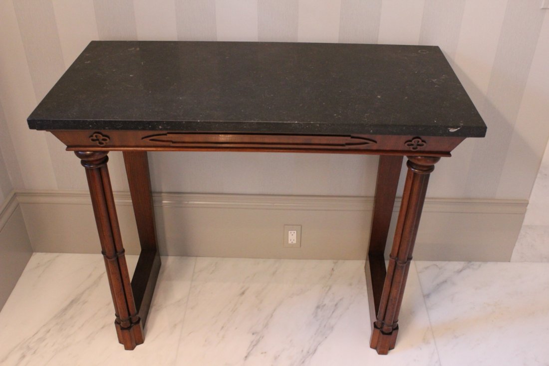 Pier table 19th Century: Description: Legs are turned and carved in flutes to appear as three separate pieces but are in fact one solid piece. Each apron support is dovetailed to the leg. Carved apron with applied molding gra