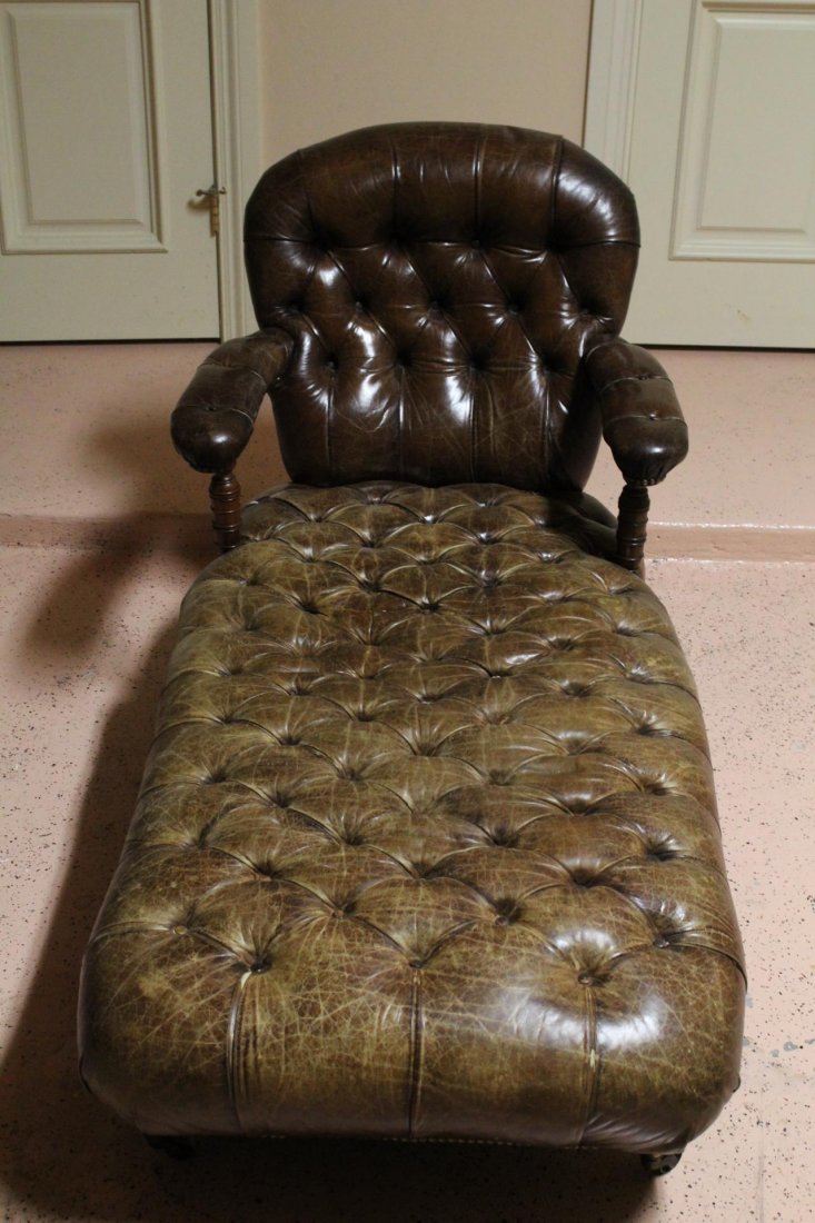 Day Bed, Tufted Leather, Howard & Sons, London: Description: A day bed, c. 1860, constructed of turned mahogany legs and arm supports, newly upholstered, tufted leather. Fire gilt brass original casters by Howard & Sons, London. Registry date and "