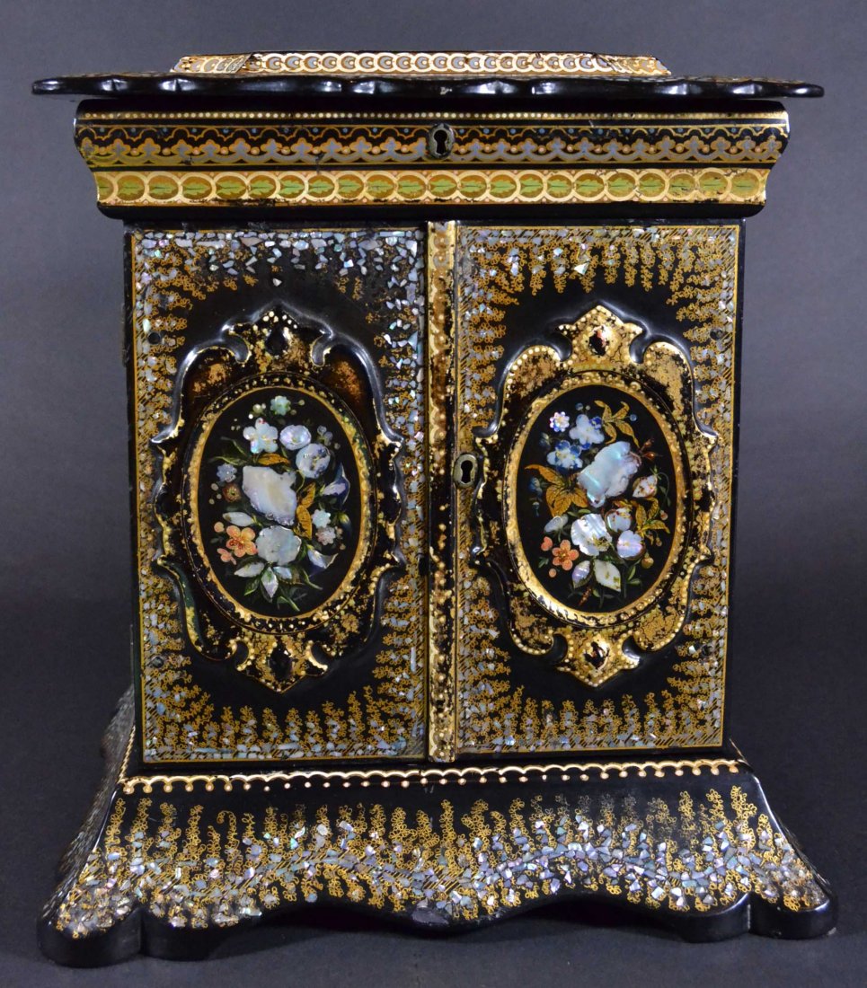 Jewelry Casket, Black Lacquer, MOP c.1860: Description: Mother-of-Pearl, black lacquer, two-door, six-drawer, two alcoves, carved MOP pulls; castle scene on top; floral decoration on door panels and sides. Mosaic surrounds of mother of pearl i