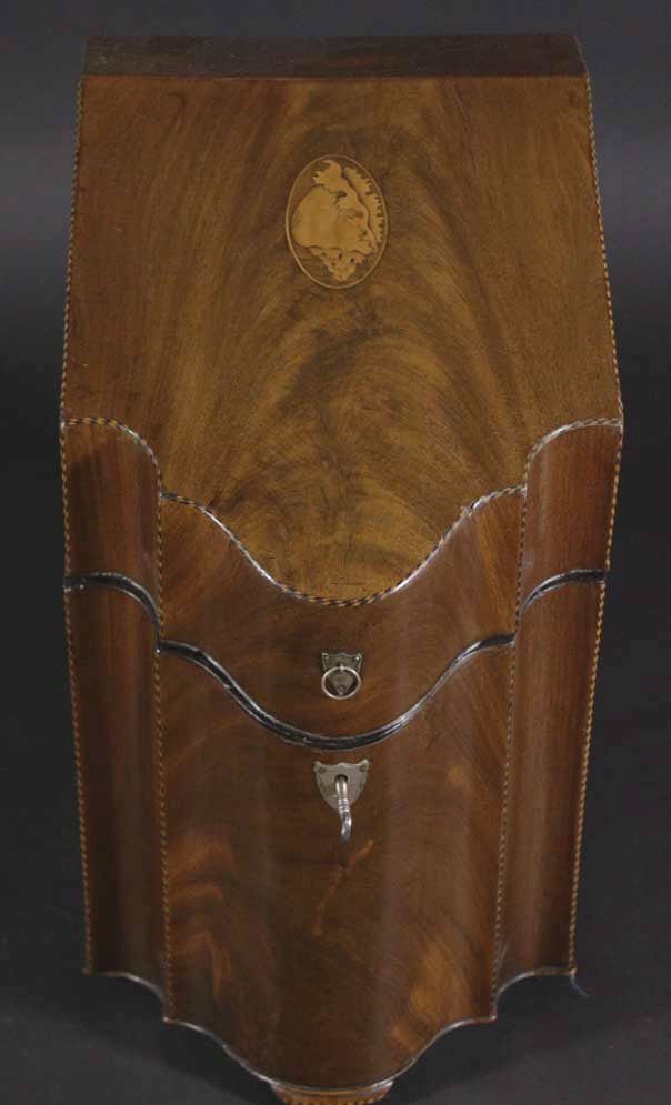 Knife Box, c. 1770: Description: Constructed of Mahogany solids & veneers, edges highlighted with checker board pattern banding, conch shell, inlaid on lid. silver shield shaped escutcheons for lock & lift rings are mark