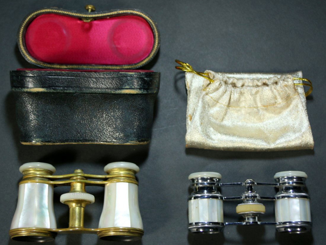 (2) Binoculars, Opera Glasses,: Description: Antique French ladies opera glasses, 2 pairs set in mother of pearl. 1.Brass trim, with mother of pearl inlay, stamped Lemaire Paris, with original case.2.Silver trim, with mother of pear