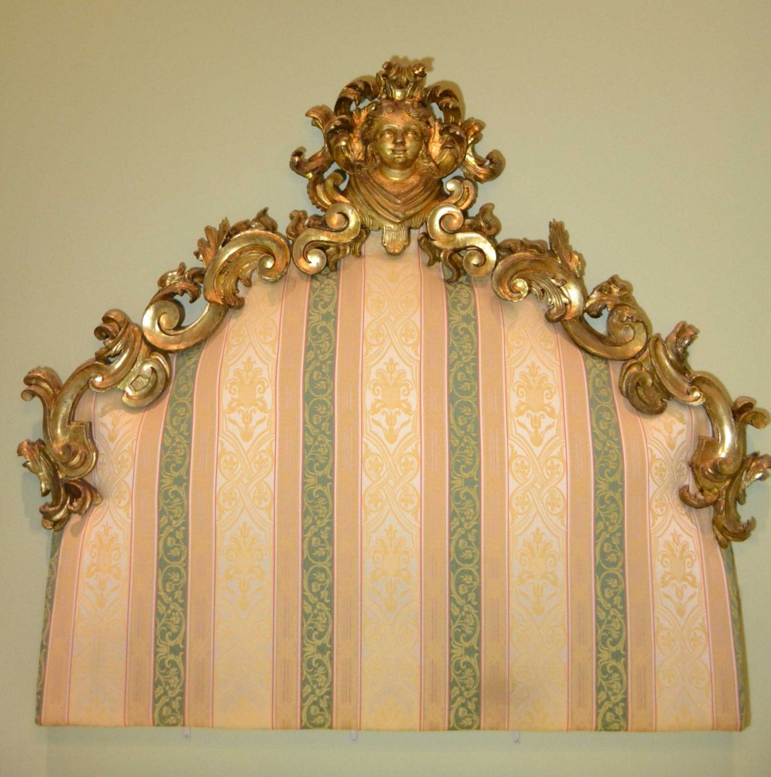 Backboard, carved and gilded, 20th c.: Description: Deeply carved, rococo style with the central feature of a woman's head. Material: Wood Maker/Artist: Unknown Date: Late 20th century Provenance: Whitenak Estate of Naples, FL. Si