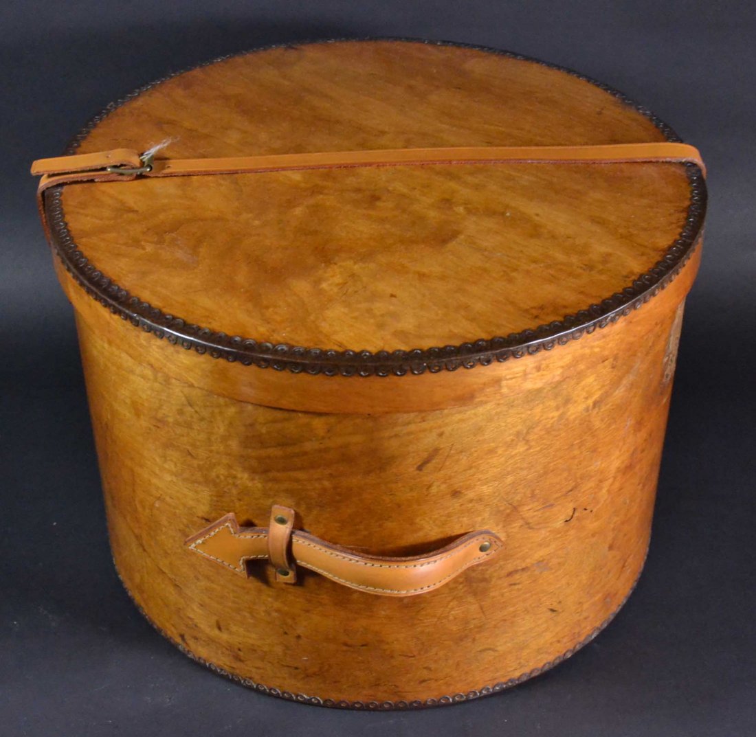 Hat Box, Drum-Shaped Hardwood w/Handle c1860: Description: Hat Box, c 1860 - A drum-shaped hardwood hatbox made in four pieces with lapped joints. Reticulated stampings, partial old label remains on exterior of box, CHAR . . . with a cross symbol