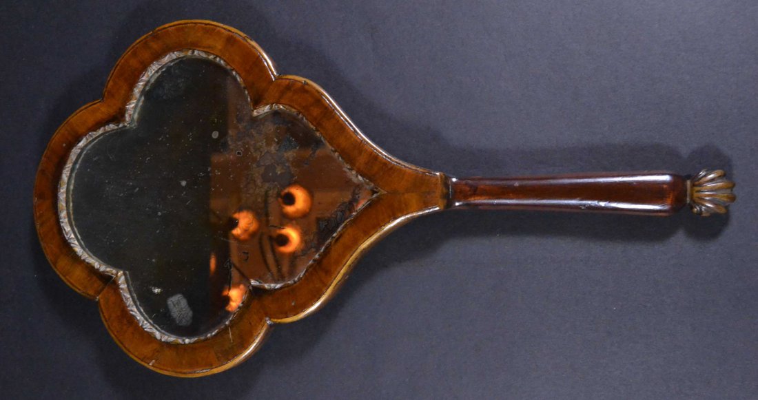 Mirror, Hand -Mahogany, Carved, Orig Glass c1800: Description: Carved interior edge, shell-carved end; original glass; c. 1800. Material: Mahogany Maker/Artist: Unnknoown Date: c 1800 Provenance: Whitenack Estate of Naples, Florida Size of A