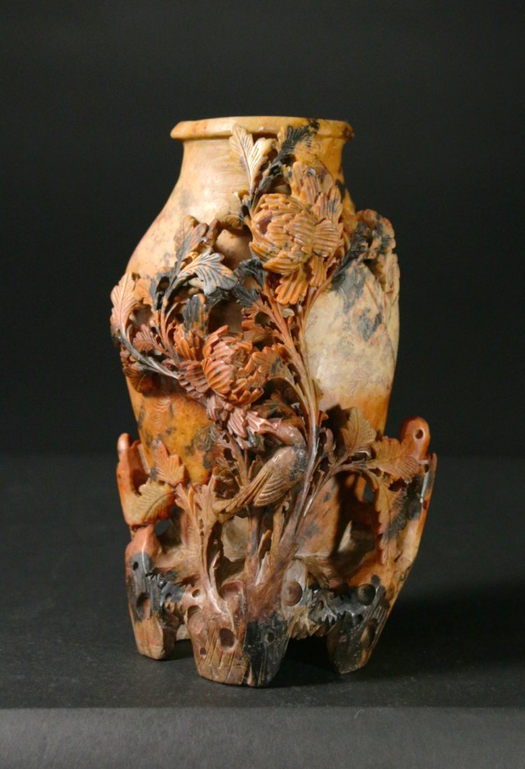 Vase, carved soapstone, 20th century: Description: A hand & relief carved soapstone vase, on, the body of the vase the hand carving is of flowers. The relief carving is a floral, leaf pattern with a small bird perched on the leaves. Mater