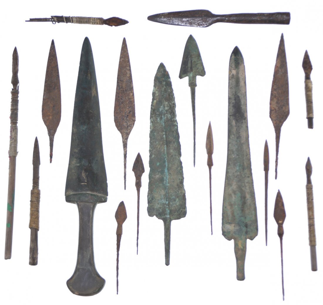 Eighteen spear points, bronze, iron, etc: Description: Various forms of piercing weapons, a total of eighteen in all, some are knives, spears, and spear points in various shapes and sizes. Four are bronze age weapons, one an iron point with s