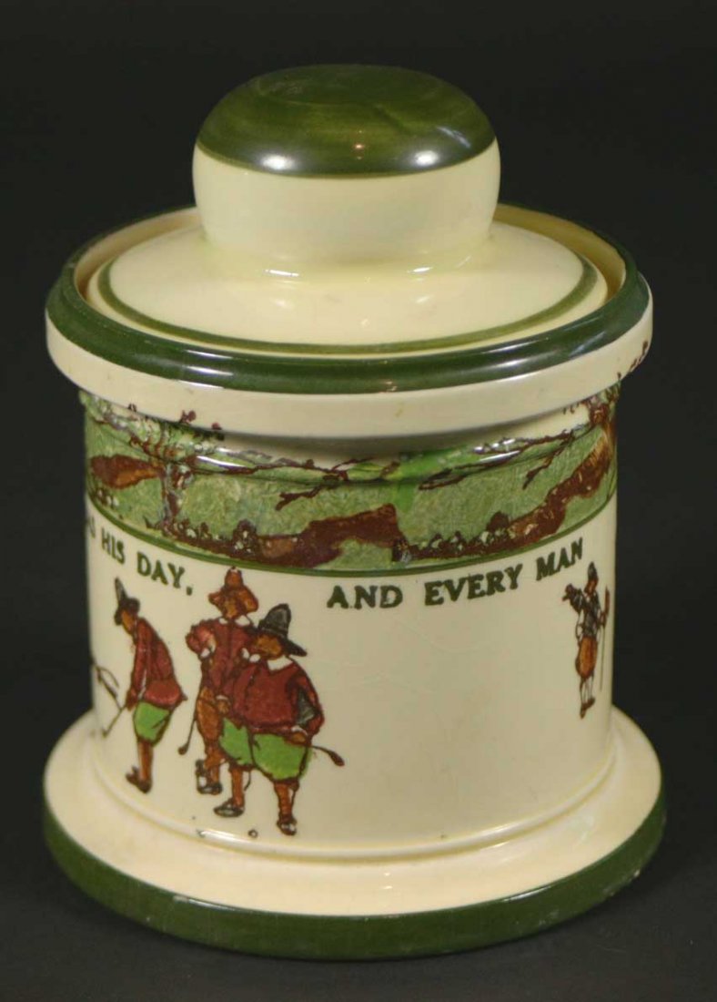 Golf Tobacco Jar 'Every Dog . . . 'Royal Doulton: Description: A Royal Doulton covered jar, illustrated from Charles Crombie's famous Rules of Golf book. Golf theme dinnerware. The covered jar reads every dog has his day, and every man has his hour. 