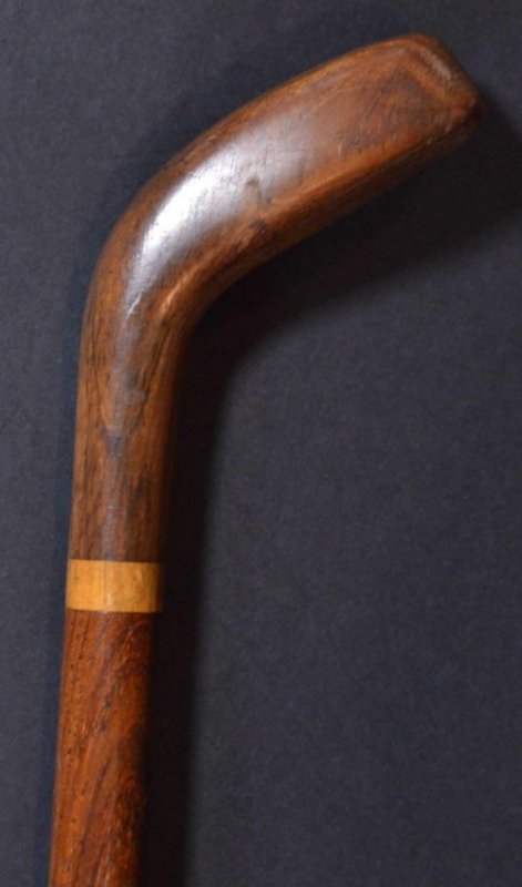 Golf Sunday Stick Mahogany Shaft c1870: Description: A golfing Sunday stick, with a mahogany head and stick. The Sunday stick is also a cane/ walking stick. Material: Mahongany Maker/Artist: Unknown Date: Circa 1870 Provenance: n/a <br